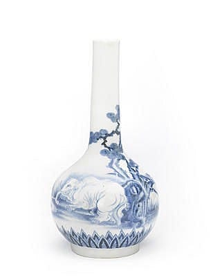 White porcelain vase with a long narrow neck, decorated in blue underglaze with waves and landscape-like scenery.