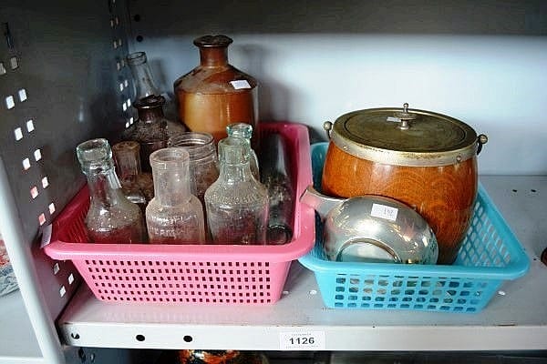 Part Shelf: lidded tobacco humidor, 2 stoneware jars, qty of vintage glass bottles, 2 EPNS Scottish quaiches sold by Bargain Hunt Auctions, lot 1126 — auction record photograph