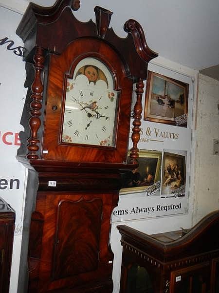 A large mahogany Grandfather clock with moon dial sold by Unique Auctions, lot 1539 — auction record photograph