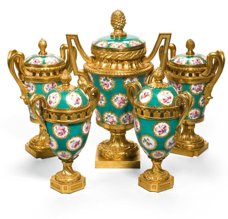 A COMPOSED GARNITURE OF FIVE GILT-BRONZE-MOUNTED SÈVRES PORCELAIN POT-POURRI VASES AND COVERS THE OVOID PAIR, AND THE LARGE VASE LOUIS XVI, LATE 18TH CENTURY, THE OTHER PAIR, IN LOUIS XVI STYLE AND EARLY 19TH CENTURY | sold by Sotheby's, lot 29 — auction record photograph