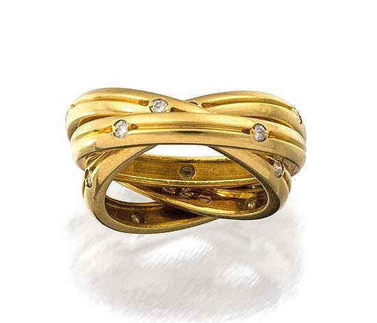 Gold multi-band ring with a twisting wave design and small round diamond accents on top.