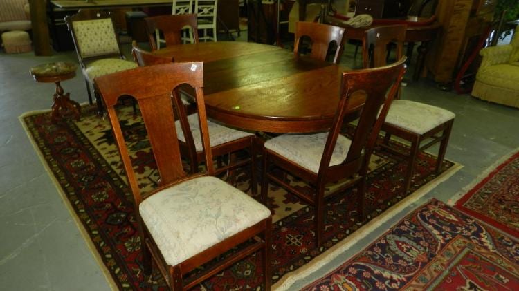 nice Antique American oak claw foot dining table and chairs (6) 3 leave, round table, special shipping required sold by Hamiltons Antique & Estate Auctions Inc., lot 292 — auction record photograph