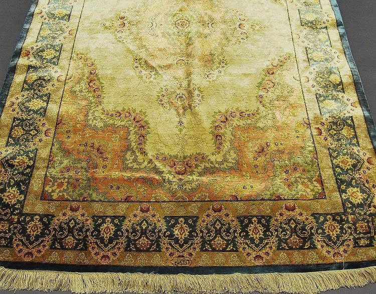A Ghom silk rug, late 20th Century, with medallion sold by Roseberys, lot 1236 — auction record photograph