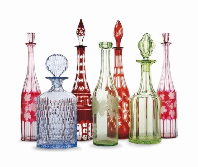 A PAIR OR VICTORIAN OR BOHEMIAN CRANBERRY OVERLAY GLASS BOTTLES AND STOPPERS sold by Christie's, lot 316 — auction record photograph