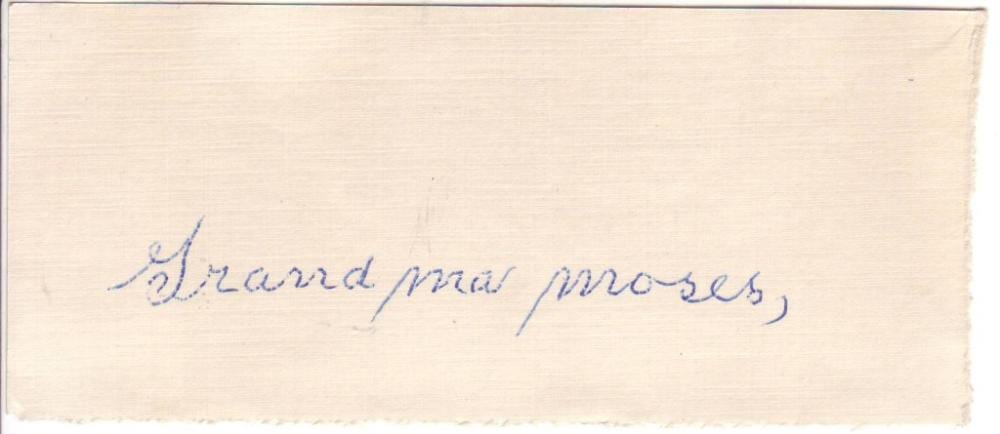 MOSES, ANNA MARY ROBERTSON ("GRANDMA"). Signature, "Grandma Moses," on a small slip of paper. sold by Swann Auction Galleries, lot 378 — auction record photograph