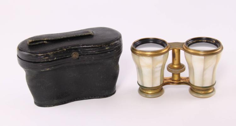 Antique-style French opera glasses with mother-of-pearl-looking eyepieces and a gold-tone frame, shown with a black leather case.