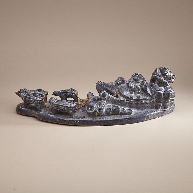 Jimmy Inaruli Arnamissak comparable auction result: jimmy inaruli arnamissak 1946 family loading komatik with sled dogs stone skin 7 x 22 x 8 17 8 x 55 9 x 20 3 cm