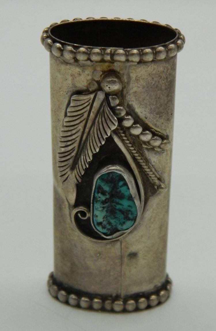 Sterling silver-toned lighter with beaded top and engraved leaf and bird motifs around an oval turquoise gemstone inset.