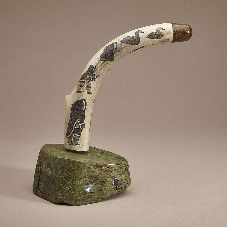 Davidee Itulu comparable auction result: davidee itulu 1929 2006 etched tusks with people animals and clothing stone antler 10 25 x 3 25 x 9 75 26 x 8 3 x 24 8 cm