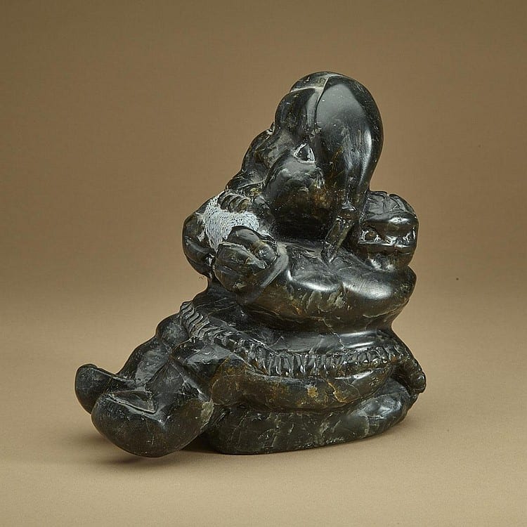 Johnny Inukpuk comparable auction result: johnny inukpuk woman with children stone 7 5 x 7 5 x 4 5 19 1 x 19 1 x 11 4 cm