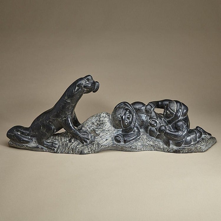 Daniel Inukpuk comparable auction result: daniel inukpuk two children playing with excited dog stone 10 5 x 29 5 x 7 5 26 7 x 74 9 x 19 1 cm