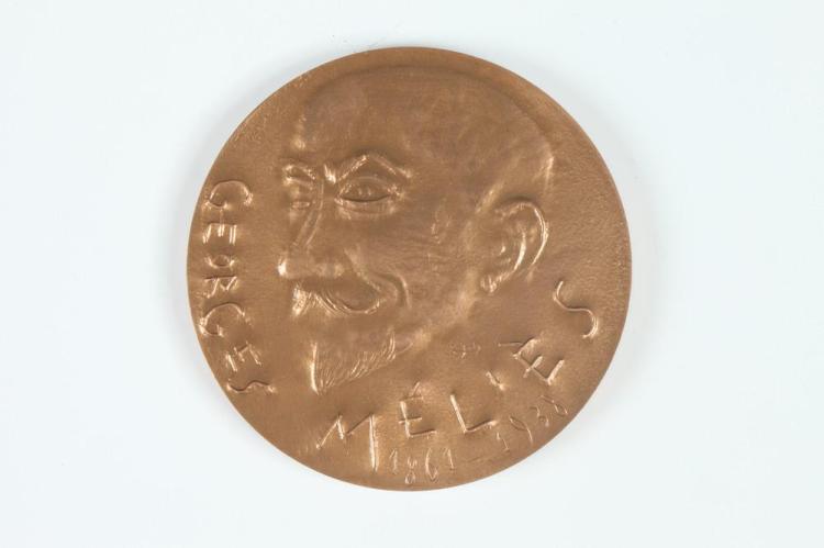 Raymond Joly comparable auction result: raymond joly french 1911 2006 georges melies bronze relief medallion obverse portrait of the french film producer reverse evocat