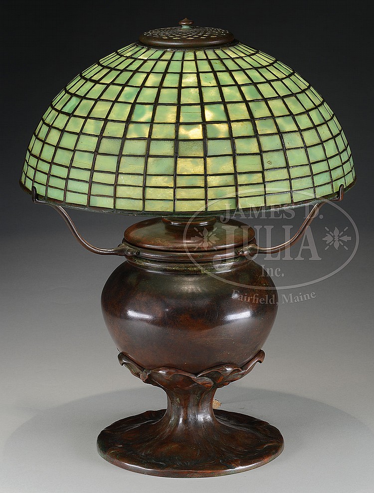 Auction comp thumbnail for TIFFANY STUDIOS GEOMETRIC TABLE LAMP. (James D. Julia, Lot 1304)