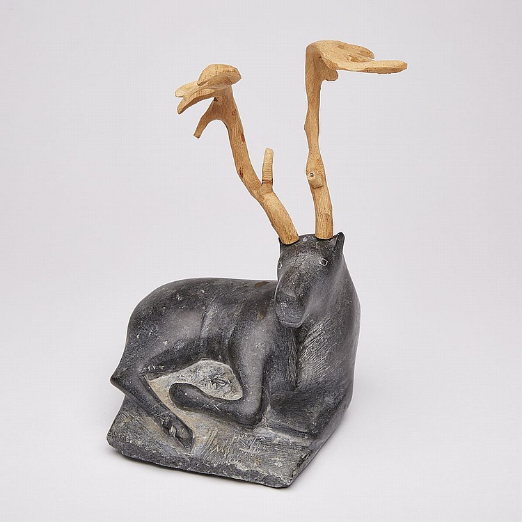Jacob Irkok comparable auction result: jacob irkok 1937 2009 sitting caribou stone wood 10 5 x 8 x 8 26 7 x 20 3 x 20 3 cm