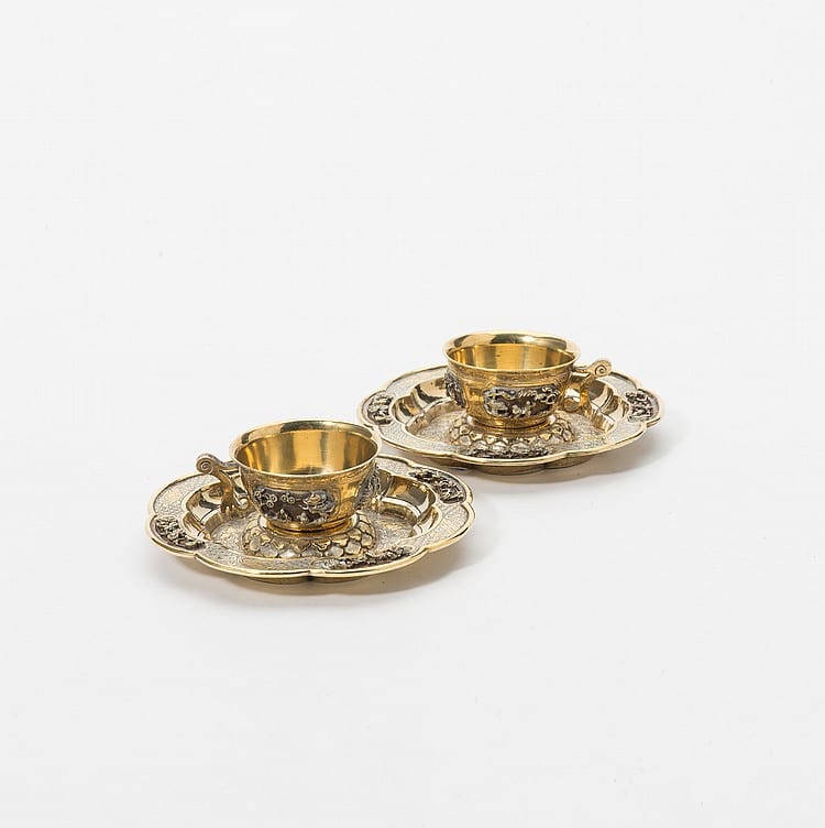 Johannes Weissenbruch comparable auction result: a pair of chinese silver parcel gilt cups and saucers