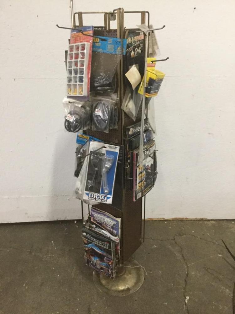 A. Davidson comparable auction result: a rotating store rack with harley davidson merchandise magazines and small accessories