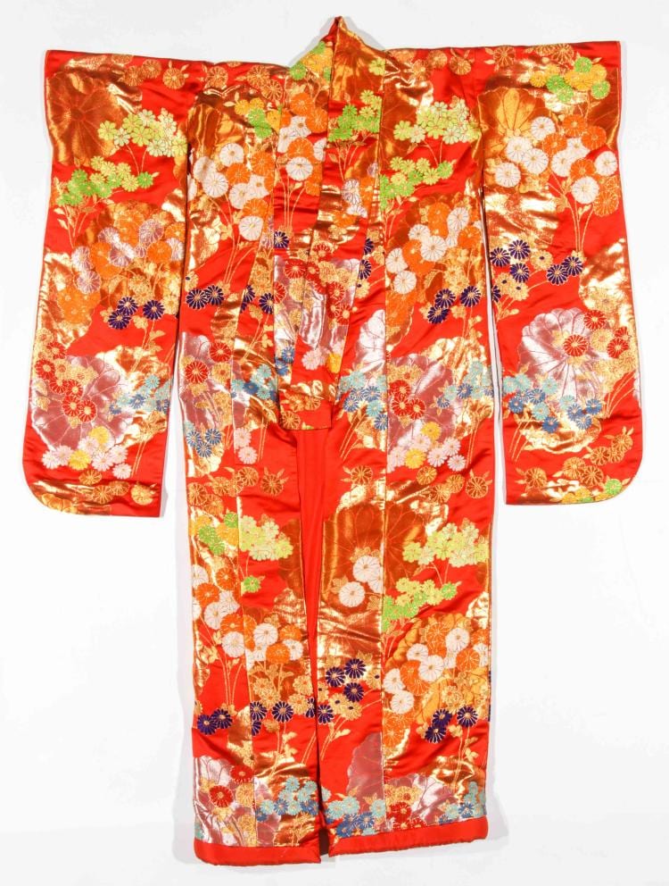 Red Japanese-style kimono with gold accents and floral patterns, shown laid flat on a white background.