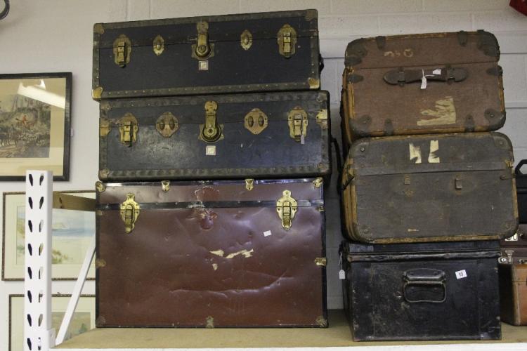 20th cent. Travel Trunks by 'Watajoy", metal bound x 2 plus a tin trunk & two steamer trunks. (6 sold by Henry Aldridge & Son Ltd, lot 13 — auction record photograph
