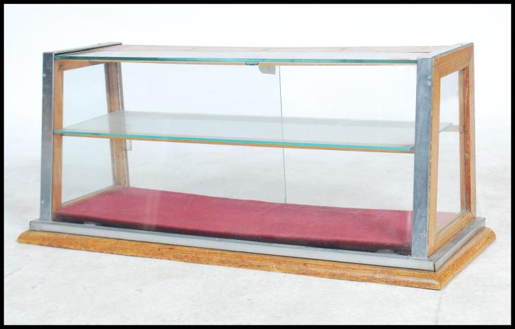 A. Sale comparable auction result: a superb point of sale showcase display cabinet