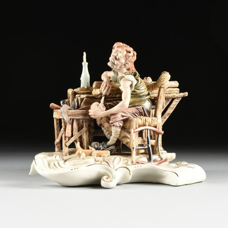 Tiziano Galli comparable auction result: tiziano galli italian 1908 1986 a polychrome enamel decorated bisque and glazed porcelain group nascita de pinocchio scultore for capodimonte porcelain naples italy