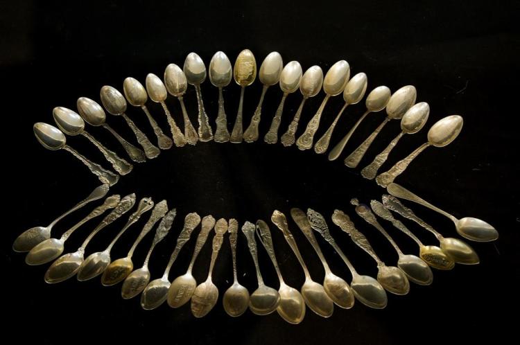 Collection of Sterling Souvenir spoons - app 38 sold by California Auctioneers, lot 3 — auction record photograph
