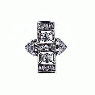 D. Ring comparable auction result: a diamond ring the rectangular plaque set with old round brilliant cut d