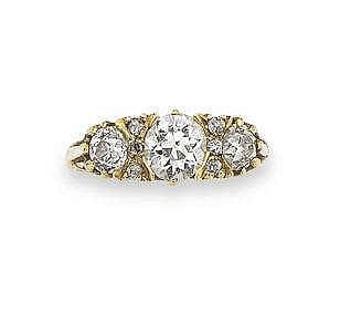 D. Ring comparable auction result: a three stone diamond ring claw set with three old round brilliant cut d