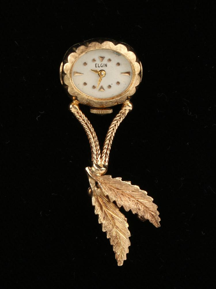 VINTAGE ELGIN LADY'S 14K GOLD LAPEL WATCH sold by Converse Auctions, lot 321 — auction record photograph
