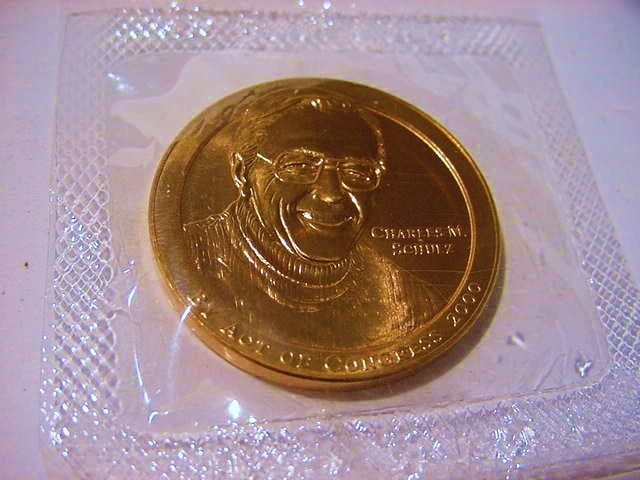 2000 CHARLES M. SCHULZ BRONZE MINT MEDAL GEM B.U. sold by Carroll's Auctioneers & Appraisers, lot 107 — auction record photograph