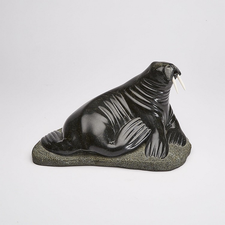 Lucassie Ikkidluak comparable auction result: lucassie ikkidluak 1949 reclining walrus stone ivory 7 5 x 13 x 9 in 19 1 x 33 x 22 9 cm