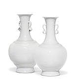 A Very Rare Pair Of Imperial WHITE-GLAZED RELIEF-CARVED BOTTLE VASES Qia comparable sale