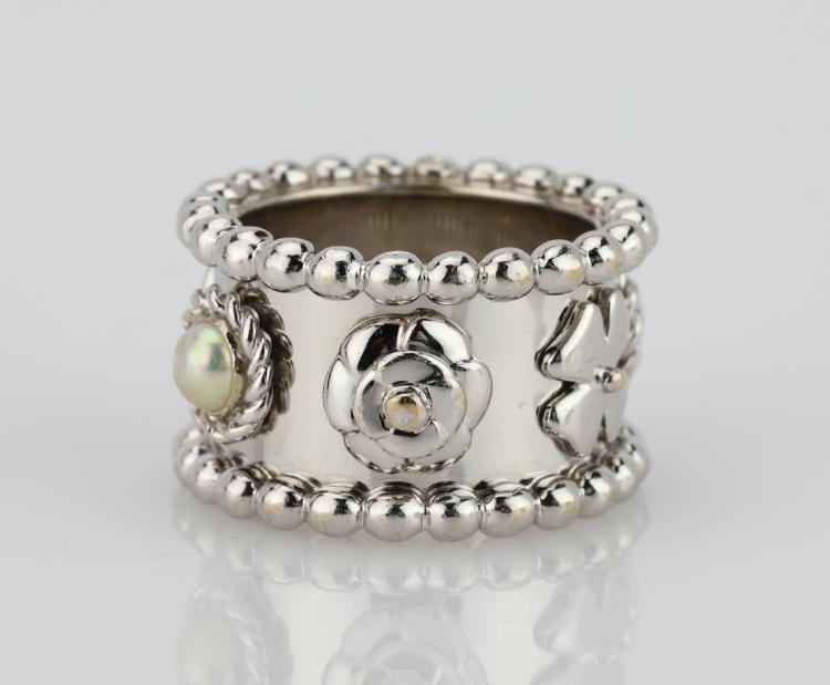 Chanel Solid 18K White Gold "Camellia & Clover" 13.5mm Wide Ring W/(2) 4mm Pearl Accents (Retired Piece) sold by GWS Auctions, lot 29 — auction record photograph