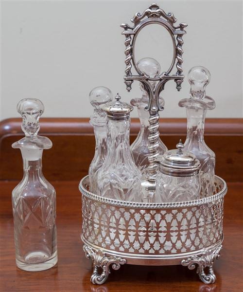 A Victorian silver plated cruet set with cut glass bottles sold by Lawsons, lot 284 — auction record photograph