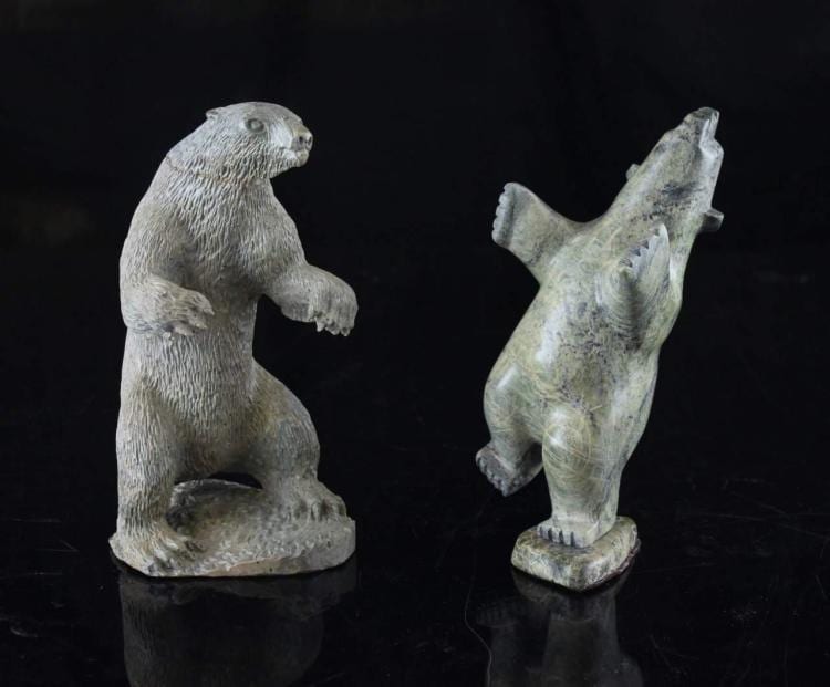 Luke Airut comparable auction result: luke airut igloolik a green stone carving of a standing polar bear signed to base 8 1 2 x 4 1 2 x 3 3 4 in together with artist