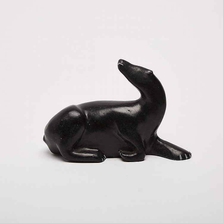 Jacob Irkok comparable auction result: jacob irkok 1937 2009 reclining bear stone 5 5 x 8 x 3 in 14 x 20 3 x 7 6 cm