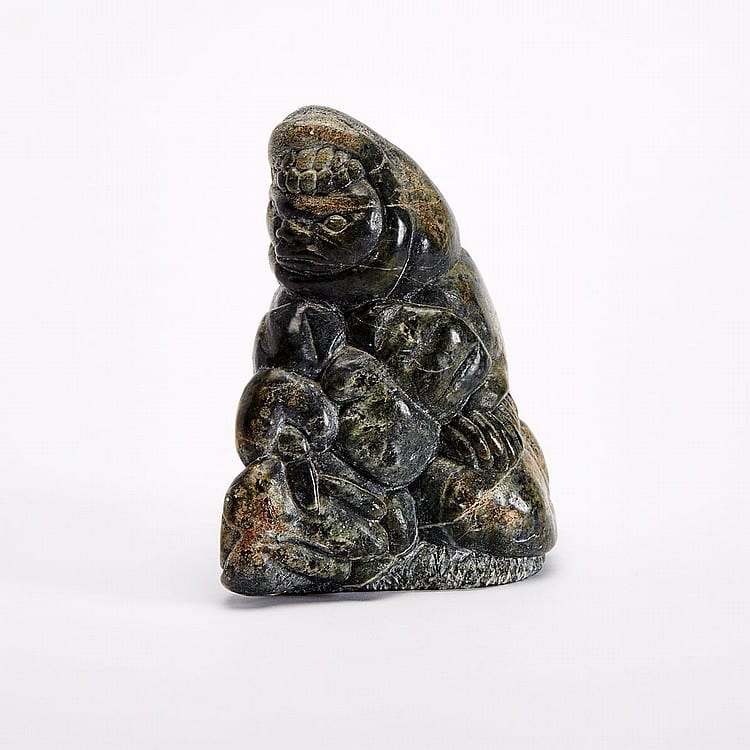 Charlie Inukpuk comparable auction result: charlie inukpuk 1941 preparing a walrus stone 6 5 x 4 5 x 6 in 16 5 x 11 4 x 15 2 cm