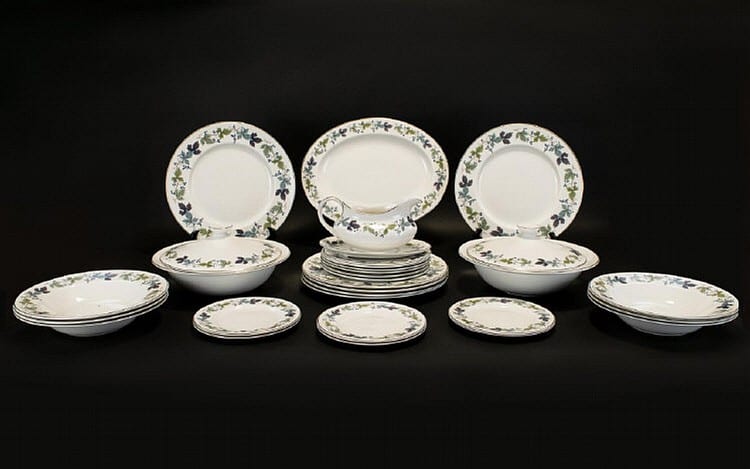 Royal Doulton 'Burgundy' Part Dinner Service Each marked to base TC100. Comprises two tureens, gravy boat and saucer, oval platter, six bowls, six saucers, six large side plates etc. 29 pieces in total. Very good condition. sold by Gerrards Auction Rooms, lot 612 — auction record photograph