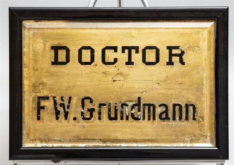 F. Gold comparable auction result: a unique gold and blck mirrored sign for a doctor f