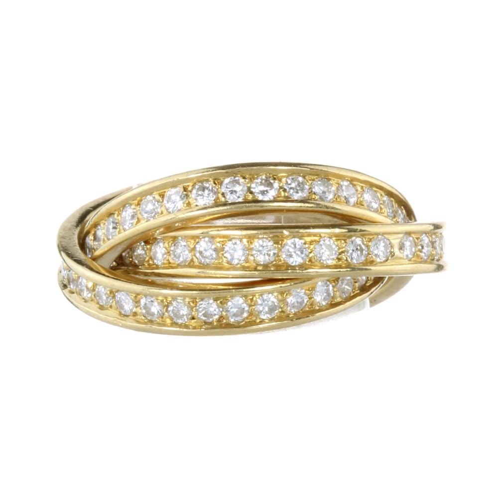 A TRINITY DE CARTIER DIAMOND RING, CARTIER in 18ct yellow gold designed as three interlocking eternity bands set with round cut diamonds totalling 1.70 carats. Signed Cartier Paris, numbered, stamped 750, French assay marks, size K / 5.5, 8.20g. sold by Elmwood's, lot 81 — auction record photograph