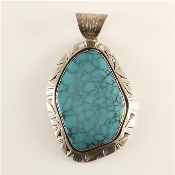 Bruce Wood comparable auction result: bruce wood turquoise with open work large silver pendant