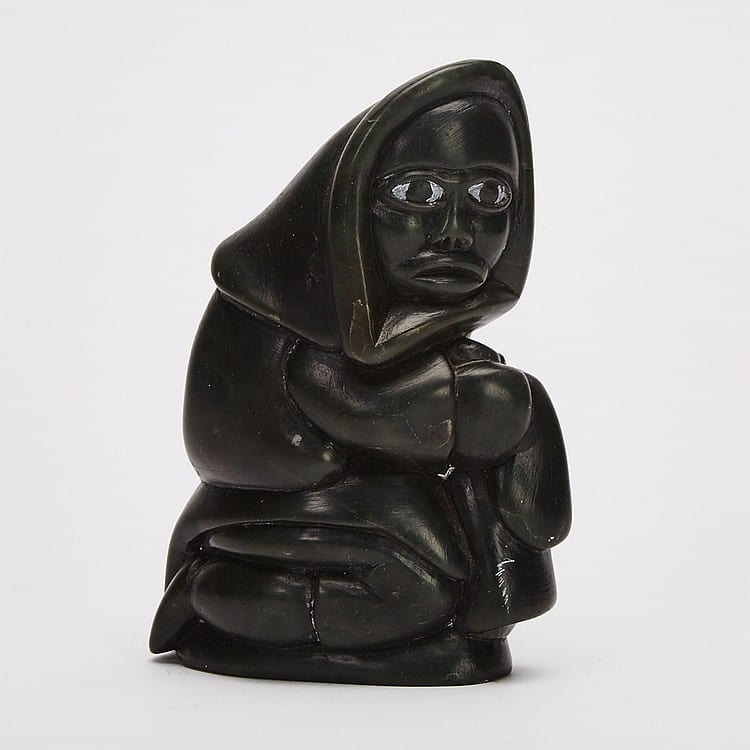 Abraham Pov comparable auction result: abraham pov 1927 1994 man holding kamik stone 5 5 x 2 x 4 in 14 x 5 1 x 10 2 cm