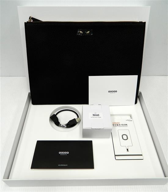 A. (1920) Carrier comparable auction result: a charging folio case marked oddeye in black plus utility carrier