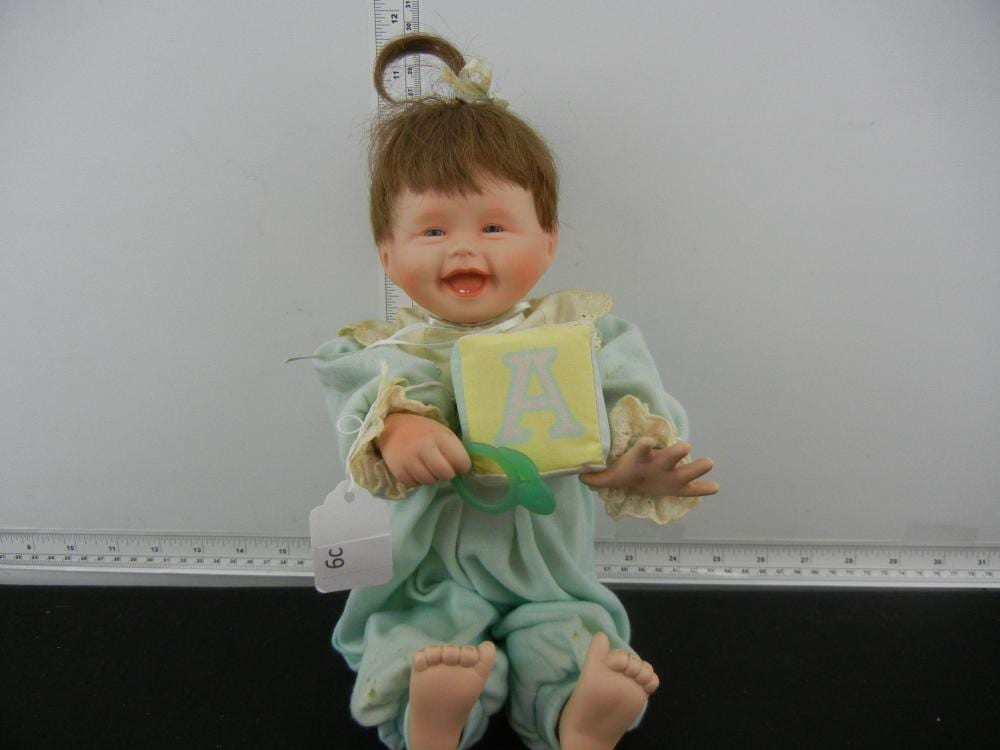 Ashton Drake Doll - My First Tooth # 1260FA sold by Richard L. Edwards Auctioneer, lot 6C — auction record photograph