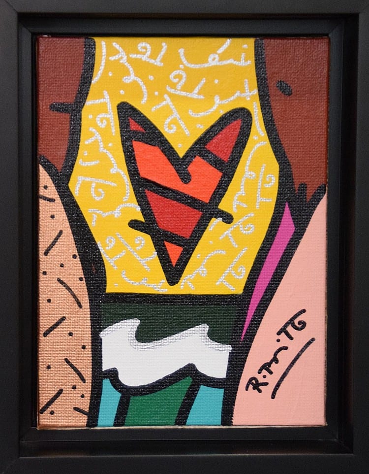 Framed colorful pop-art painting of a red heart with black outlines and patterned blocks.