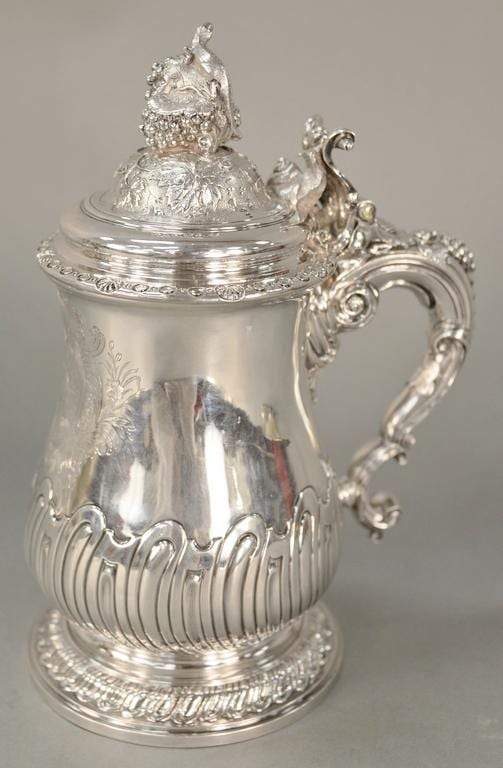 Paul de Lamerie comparable auction result: paul de lamerie 1688 1751 important silver tankard having finial with lizard on punch work grape leaves and grapes over scrolling
