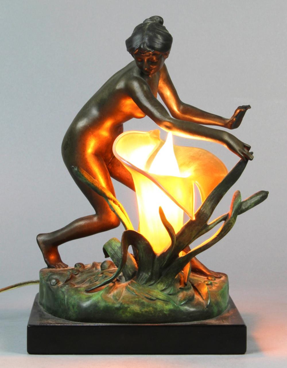 Jean Jacottet comparable auction result: art nouveau style figural bronze and gold aurene glass shade boudoir lamp after louis j