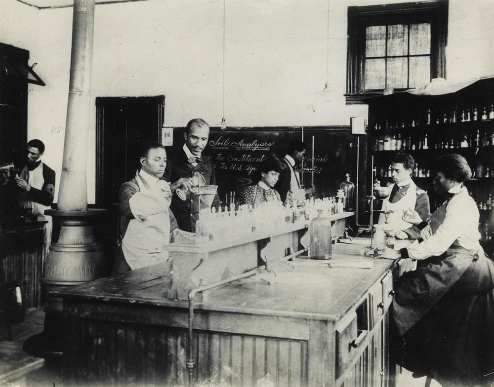 George Washington Carver comparable auction result: tuskegee institute george washington carver 1864 1943 supervising male and female students at tuskegee institute
