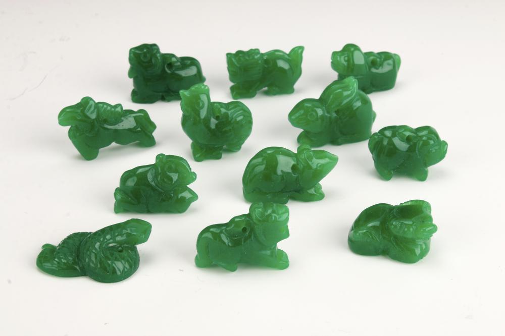 TWELVE PIECES CHINESE JADE ZODIAC ANIMALS sold by Converse Auctions, lot 420 — auction record photograph