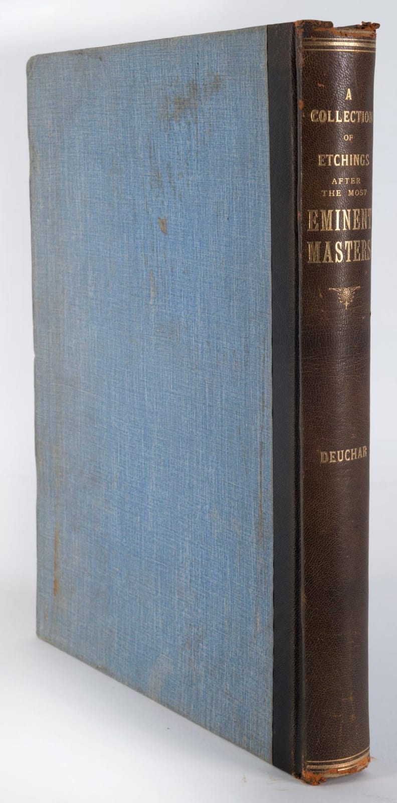 Blue cloth-bound volume with a dark leather spine stamped in gilt, reading “A Collection of Etchings After the Most Eminent Masters” and “Deuchar.”