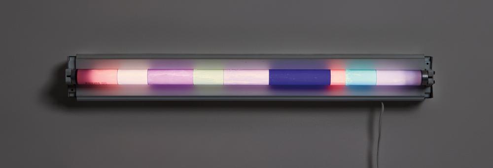 Abstract illuminated strip artwork with layered colored bands (pink, purple, blue, green) in a metal lightbox.